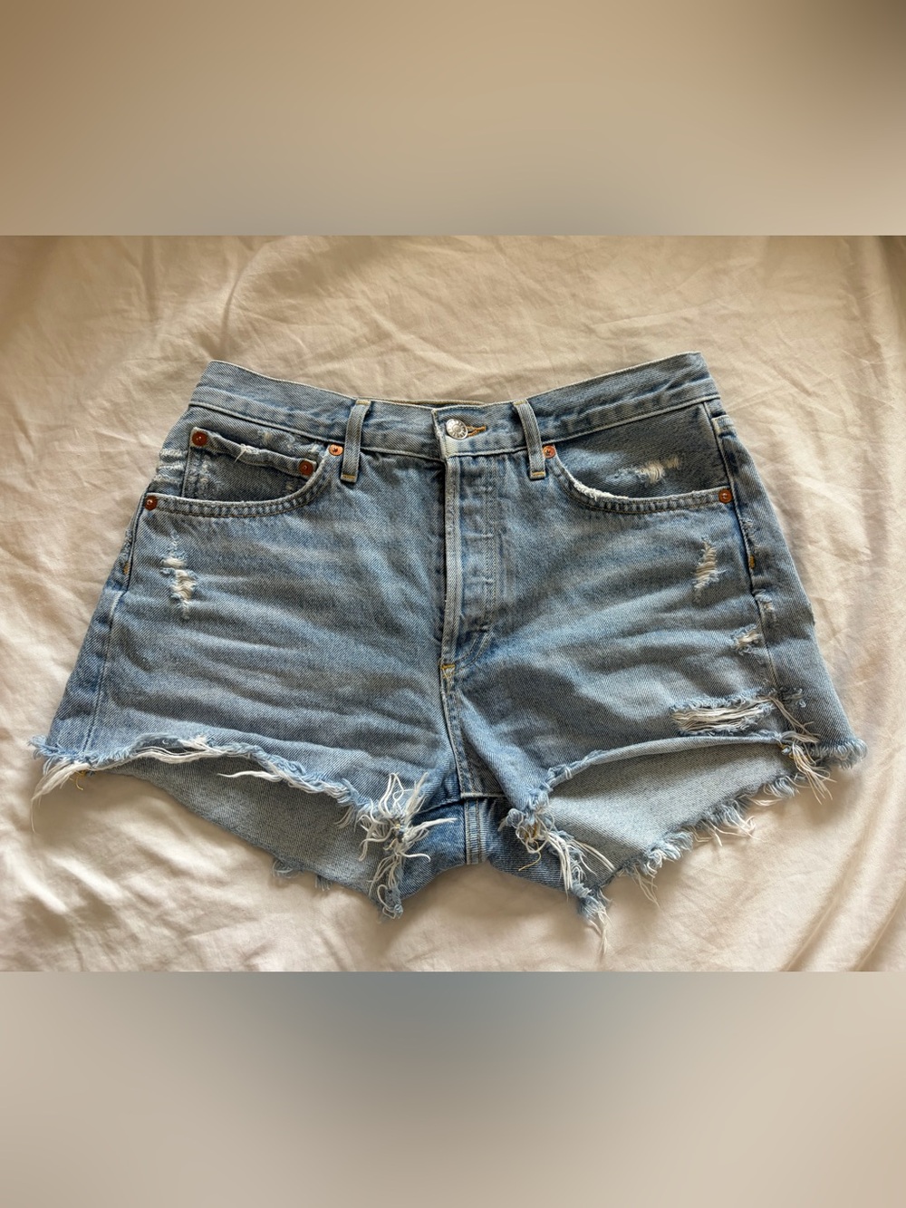 Agolde Light Blue Distressed Denim Cutoff Shorts